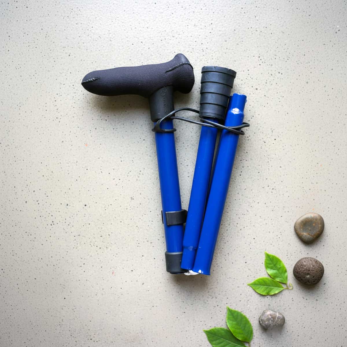 Close up view of Cool Crutches folding walking stick ergonomic offset handle with soft grip material