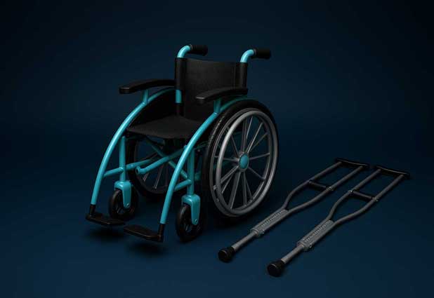 Crutches and wheelchair staged together on a deep blue background