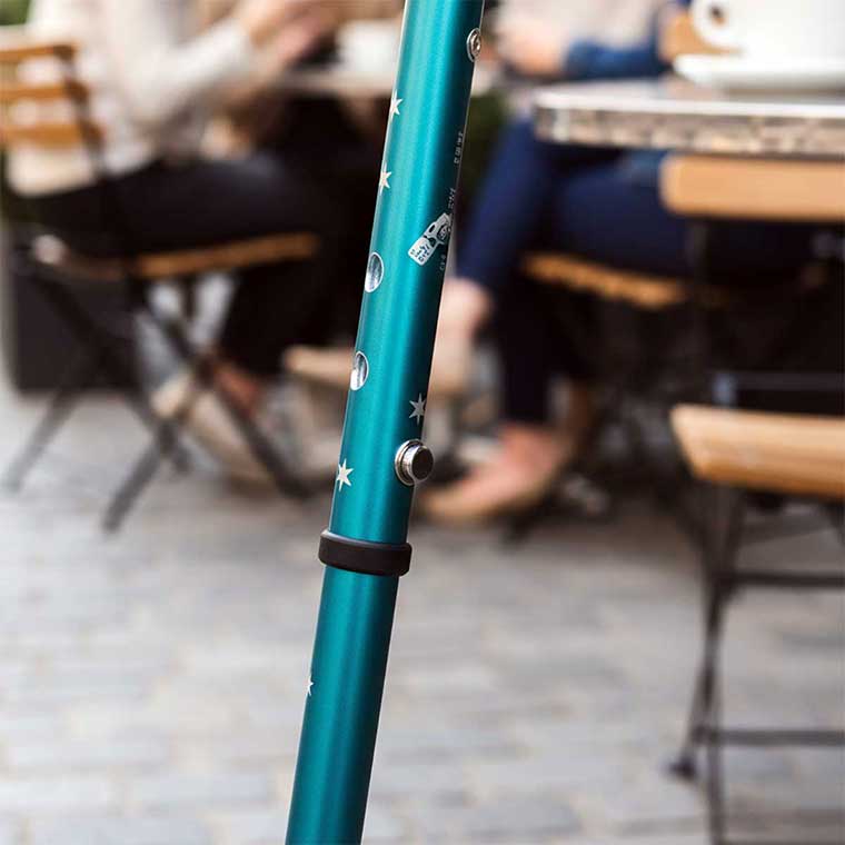 Cool Crutches folding walking stick height adjustment mechanism showing adjustable shaft