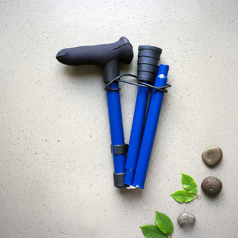 Close up view of Cool Crutches folding walking stick ergonomic offset handle with soft grip material