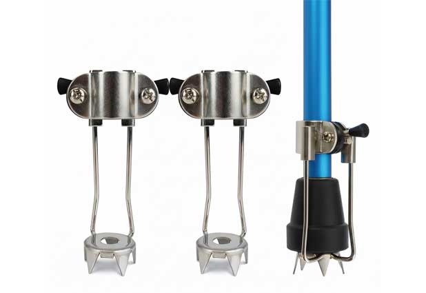 Yaktrax ice grip tips installed on crutch showing retractable carbide steel spikes